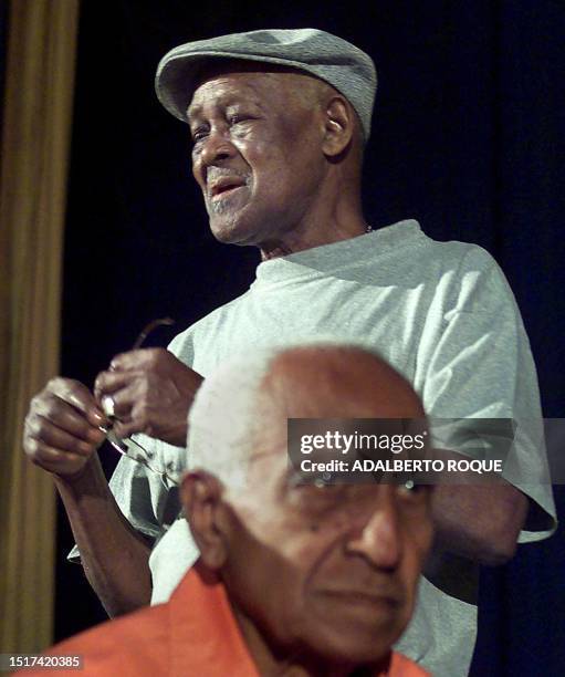 Singer Ibrahim Ferrer and pianist Ruben Gonzalez two of the Cuban musicians, who are members of the musical group Buena Vista Social Club, prepare 11...