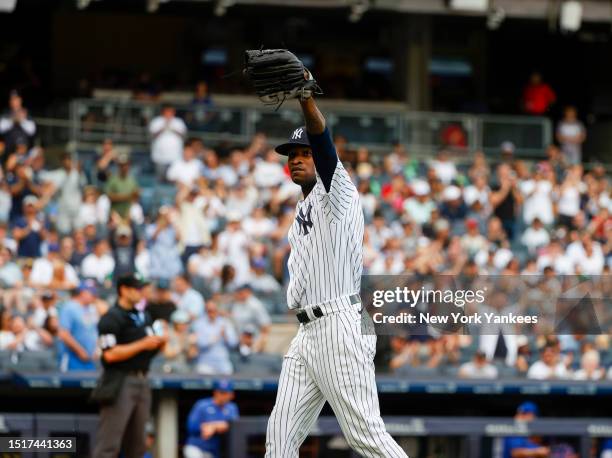 July 9: Domingo Germán of the New York Yankees gestures to the crowd during a game against the Chicago Cubs at Yankee Stadium on July 9 in New York,...