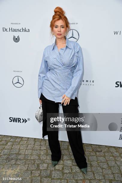 Palina Rojinski attends the "William Fan - In Between" film premiere at Delphi Filmpalast on July 9, 2023 in Berlin, Germany.