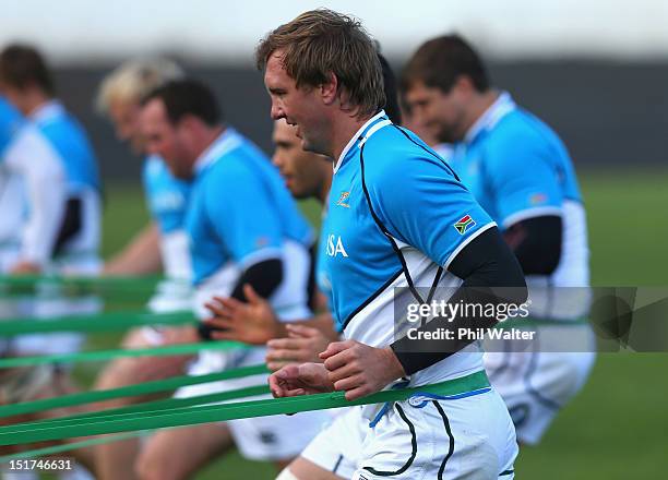 Andries Bekker of South Africa warms up during a South African Springboks training session at Western Springs Stadium on September 11, 2012 in...