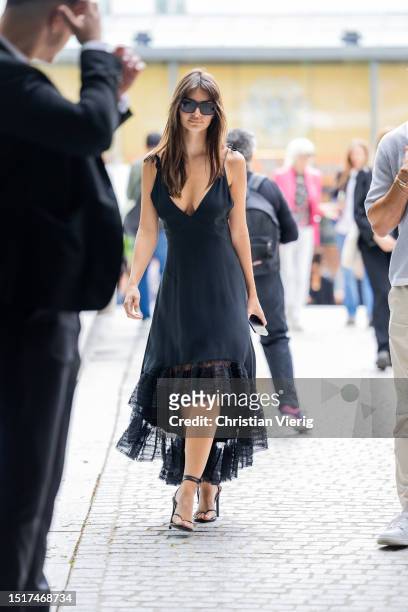 Emily Ratajkowski is seen wearing sunglasses, black dress outside Viktor & Rolf during the Haute Couture Fall/Winter 2023/2024 as part of Paris...