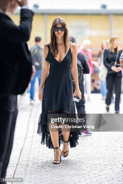 Emily Ratajkowski is seen wearing sunglasses, black dress outside Viktor & Rolf during the Haute Couture Fall/Winter 2023/2024 as part of Paris...