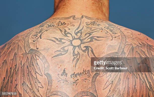Detail of a tattoo on the back of Travis Cloke of the Magpies during a Collingwood Magpies AFL recovery session at the St Kilda Sea Baths on...