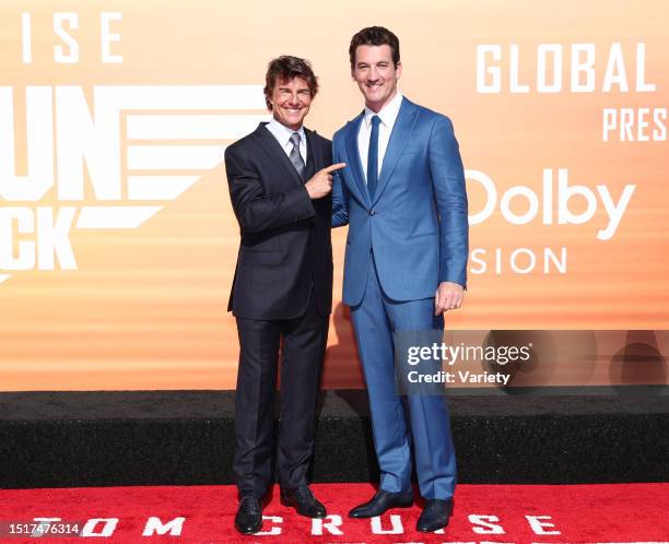 Tom Cruise and Miles Teller at the premiere of 'Top Gun: Maverick' held at USS Midway on May 4th, 2022 in San Diego, California.