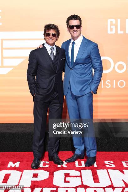 Tom Cruise and Miles Teller at the premiere of 'Top Gun: Maverick' held at USS Midway on May 4th, 2022 in San Diego, California.