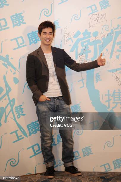 Vic Chou attends 20th anniversary of Weikang on September 10, 2012 in Beijing, China.