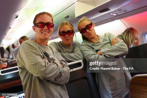 Keira Walsh, Ellie Roebuck and Georgia Stanway of England pose for a photo as the Lionesses depart for the FIFA Women's World Cup at Heathrow Airport...