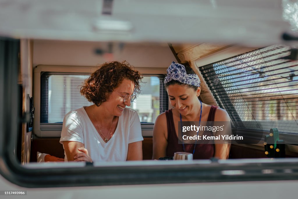 Lesbian Couple having fun in their camper