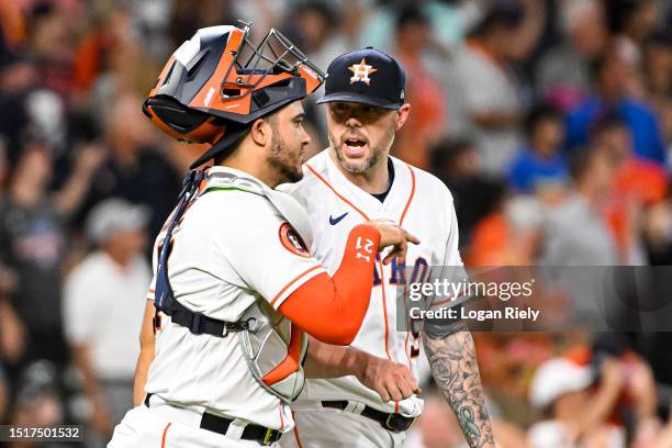 Ryan Pressly of the Houston Astros celebrates with Yainer Diaz after the game against the Colorado Rockies in the ninth inning at Minute Maid Park on...