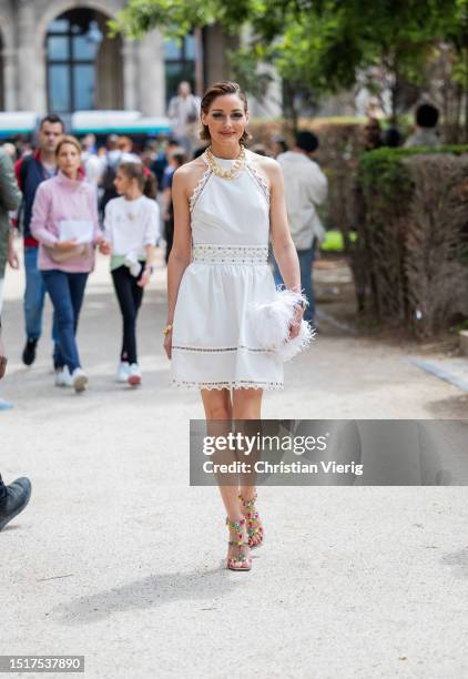Olivia Palermo is seen wearing white dress outside Elie Saab during the Haute Couture Fall/Winter 2023/2024 as part of Paris Fashion Week on July 05,...