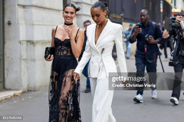 Sara Sampaio is seen wearing black laced dress & Jasmine Tookes is seen wearing white suit outside Zuhair Murad during the Haute Couture Fall/Winter...