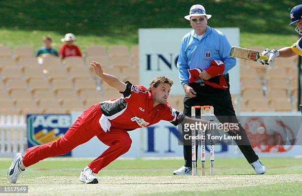 Mark Harrity of the Redbacks tries but fails to field a shot from Braad Hodge of the Bushranger during the ING Cup match between the South Australian...