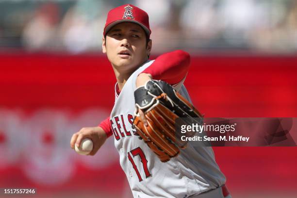 Shohei Ohtani of the Los Angeles Angels pitches during the first inning of a game against the San Diego Padres at PETCO Park on July 04, 2023 in San...