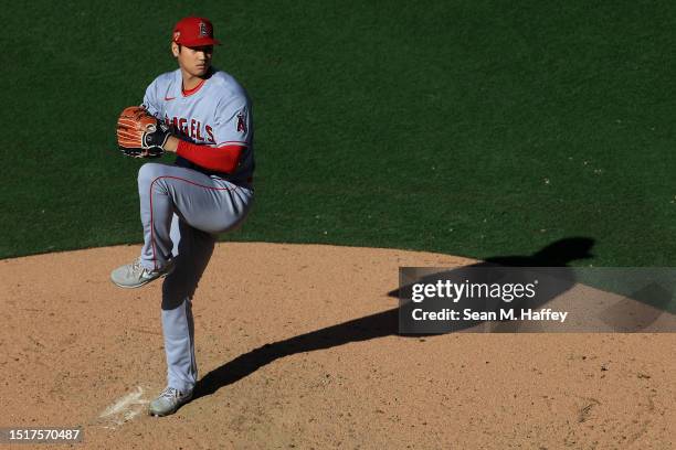 Shohei Ohtani of the Los Angeles Angels pitches during the fourth inning of a game against the San Diego Padres at PETCO Park on July 04, 2023 in San...