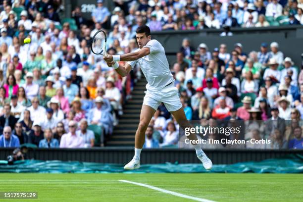 Novak Djokovic of Serbia in action against Jordan Thompson of Australia in the Gentlemen's Singles second-round match on Centre Court during the...