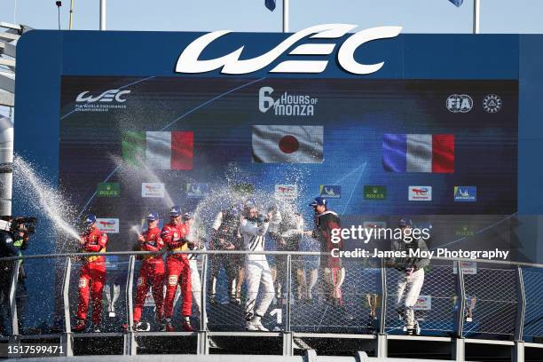 The second placed Ferrari AF Corse drivers Antonio Fuoco, Miguel Molina, and Nicklas Nielsen; race winners Toyota Gazoo Racing Toyota drivers Kamui...