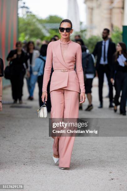 Nieves Alvarez is seen wearing rose belted blazer, pants, bag outside Elie Saab during the Haute Couture Fall/Winter 2023/2024 as part of Paris...