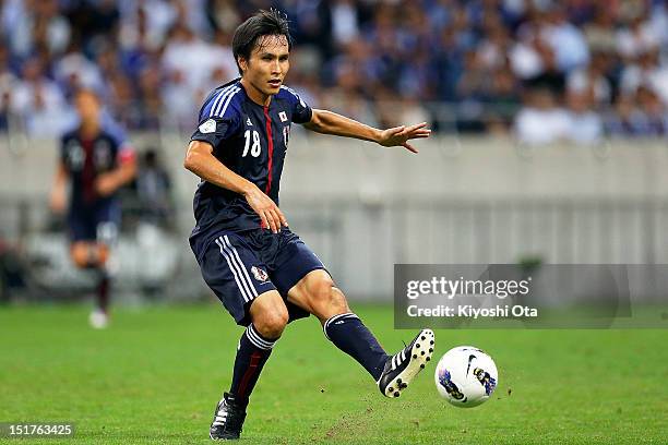 Ryoichi Maeda of Japan passes the ball during the FIFA World Cup final qualifier match between Japan and Iraq at Saitama Stadium on September 11,...