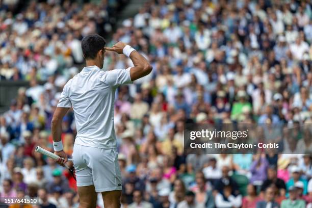 Novak Djokovic of Serbia reacts after winning the second set against Jordan Thompson of Australia in the Gentlemen's Singles second-round match on...