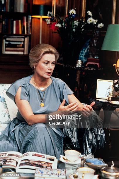 Princess Grace of Monaco poses at home in June 1981 in Paris. Grace Kelly, American born, who married Prince Rainier III of Monaco in 1956, was a...