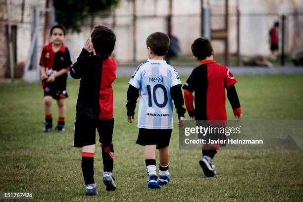 Group of children who wear Argentina and Newell´s Old Boys jerseys play at Malvinas Argentinas Sports Complex on April 27, 2010 in Rosario,...