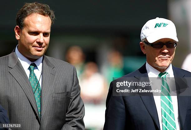 New York Jets GM Mike Tannenbaum and owner Woody Johnson appear at a ceremony during their season opener against the Buffalo Bills at MetLife Stadium...