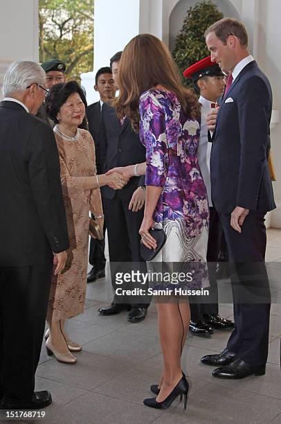 Catherine, Duchess of Cambridge meets the President of Singapore's wife Mary Tan at the Istana for a State Dinner on day 1 of their Diamond Jubilee...