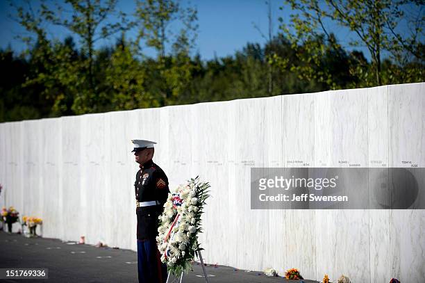Marine Honor Guard stands in front of the Wall of Names at the Flight 93 National Memorial during observances commemorating the eleventh anniversary...