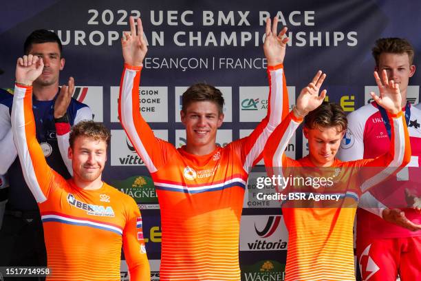Jay Schippers of the Netherlands, Niek Kimmann of the Netherlands and Jaymio Brink of the Netherlands celebrate after first place in the Men's Team...