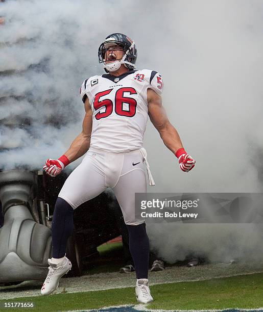 Brian Cushing of the Houston Texans is introduced to the crowd before playing the Miami Dolphins during their season opener at Reliant Stadium on...