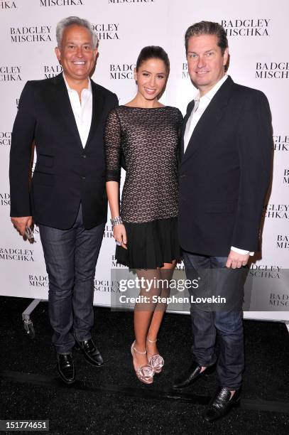 Designer Mark Badgley, actress Mercedes Masohn and designer James Mischka pose backstage at the Badgley Mischka show during the Spring 2013...