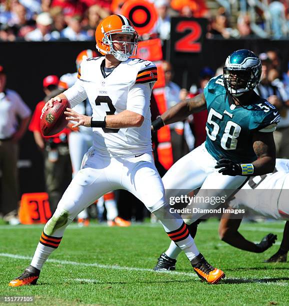 Quarterback Brandon Weeden of the Cleveland Browns drops back to pass during a game with the Philadelphia Eagles at Cleveland Browns Stadium in...