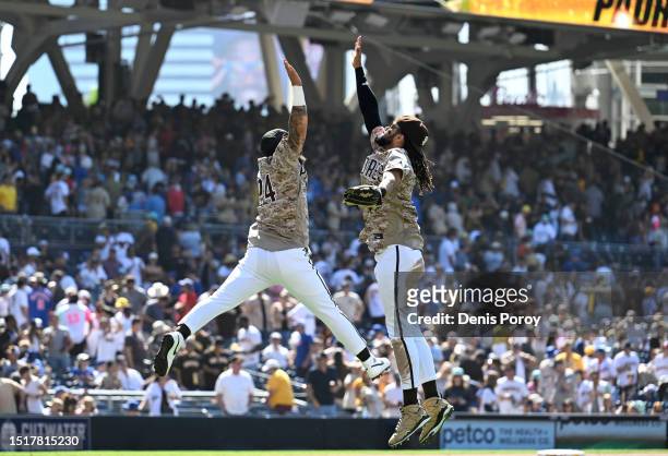 Rougned Odor and Fernando Tatis Jr. #23 of the San Diego Padres celebrate after the Padres defeated the New York Mets 6-2 in a baseball game July 9,...