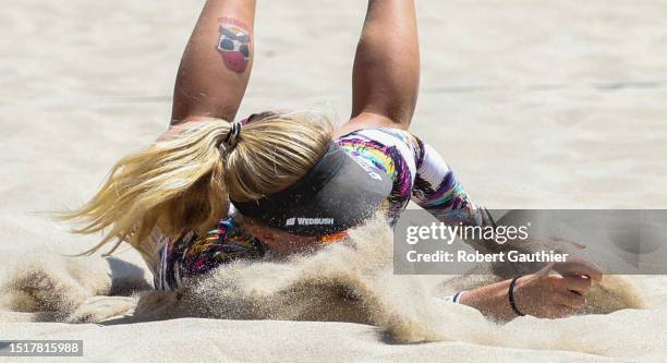 Hermosa Beach, CA, Sunday, July 9, 2023 - Corinne Quiggle kicks up sand after missing a diving attempt during the AVP Pro Series women's final...