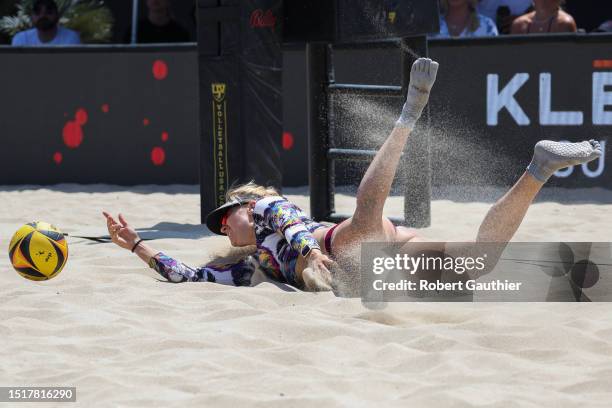 Hermosa Beach, CA, Sunday, July 9, 2023 - Corinne Quiggle kicks up sand after missing a diving attempt during the AVP Pro Series women's final...