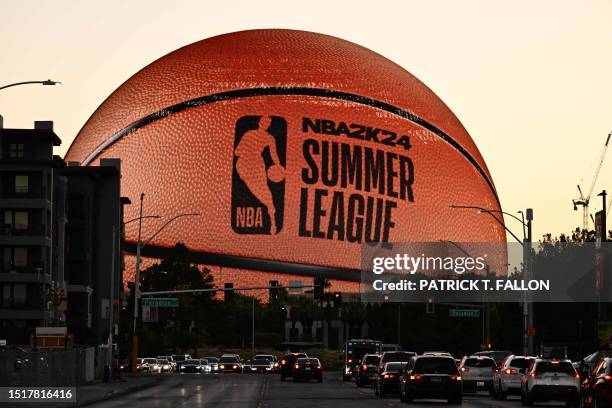 The MSG Sphere, new music entertainment arena, is lit up as a basketball to celebrate the 2023 NBA Summer League in Las Vegas, Nevada, on July 9,...