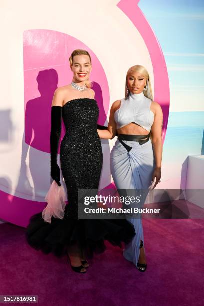 Margot Robbie and Nicki Minaj at the premiere of "Barbie" held at Shrine Auditorium and Expo Hall on July 9, 2023 in Los Angeles, California.