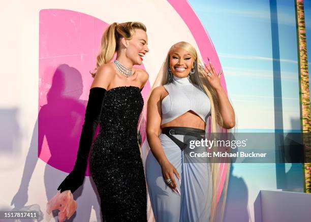 Margot Robbie and Nicki Minaj at the premiere of "Barbie" held at Shrine Auditorium and Expo Hall on July 9, 2023 in Los Angeles, California.