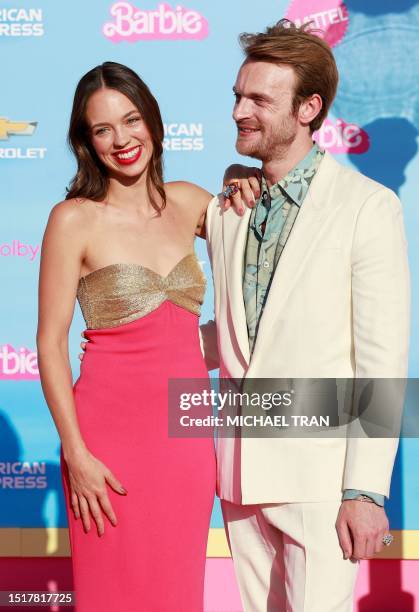 Singer-songwriter Finneas O'Connell and partner YouTuber Claudia Sulewski arrive for the world premiere of "Barbie" at the Shrine Auditorium in Los...