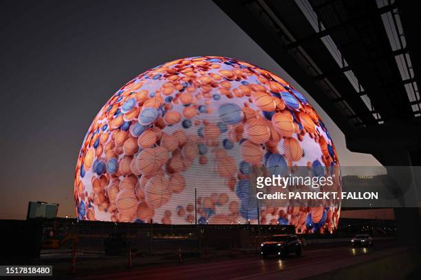 The MSG Sphere, a new music entertainment arena, is lit up with basketballs to celebrate the 2023 NBA Summer League in Las Vegas, Nevada, on July 9,...