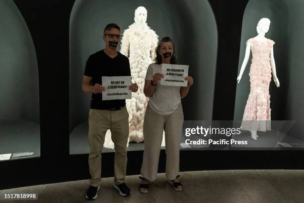 Activists from Extinction Rebellion staged solidarity protest and covered their mouths with pieces of tape at The Costume Institute exhibition Karl...