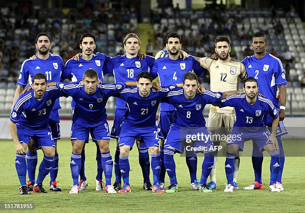 Cyprus's national football team poses for a photo before the start of their FIFA 2014 World Cup group E qualifying football match against Iceland in...