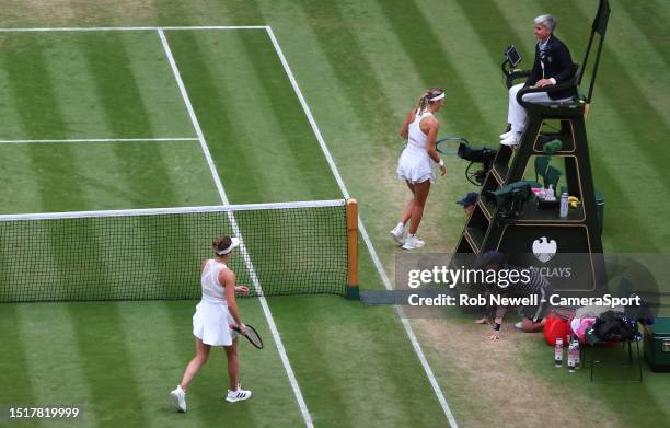 Elina Svitolina and Victoria Azarenka [19] refuse to shake hands after their Ladies' Singles Fourth Round match during day seven of The Championships...