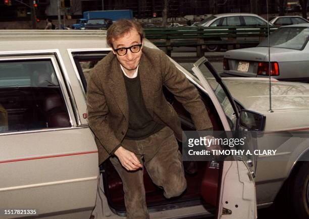 Picture taken 27 April 1993 of US movie director and actor Woody Allen getting out of a car on his way to the courthouse in New York. A judge gave...