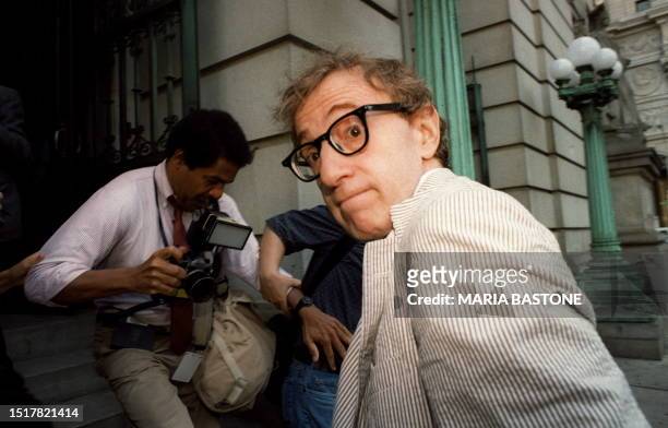 Picture taken 09 June 1993 of US movie director and actor Woody Allen making his way through the media to the courthouse in New York. A judge gave...