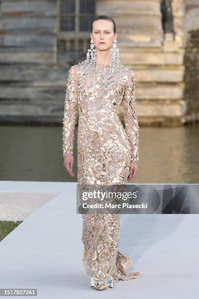 Model walks the runway during the Valentino Haute Couture Fall/Winter 2023/2024 show as part of Paris Fashion Week at Chateau de Chantilly on July...