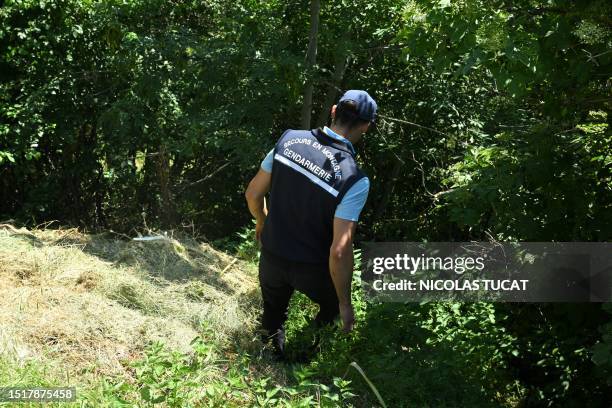 French gendarme takes part in a search operation for two-and-a-half-year-old Emile who is reported missing for two days, on July 10, 2023 in the...