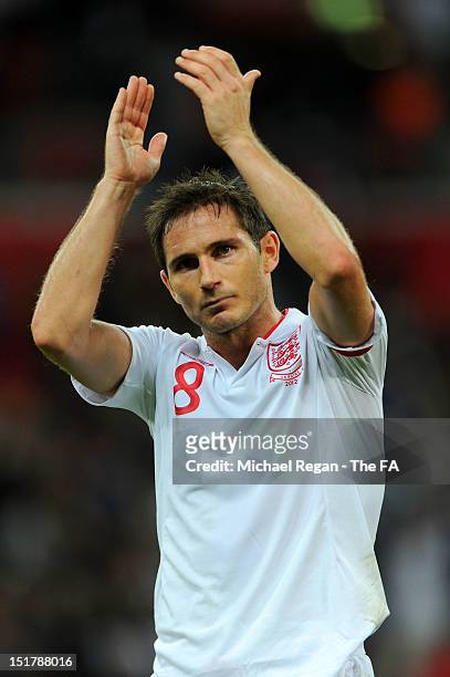 England goal scorer Frank Lampard applauds the fans following the final whistle during the FIFA 2014 World Cup qualifier group H match between...