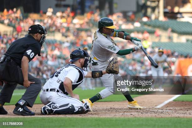 Esteury Ruiz of the Oakland Athletics hits a sixth inning single to score two runs in front of Jake Rogers of the Detroit Tigers at Comerica Park on...