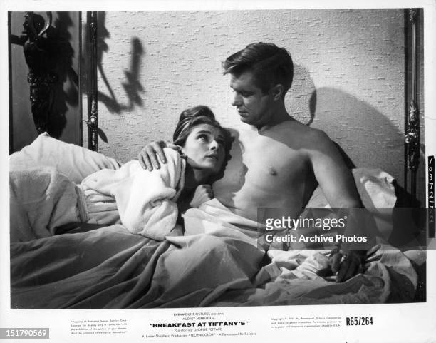 Audrey Hepburn and George Peppard in bed in a scene from the film 'Breakfast At Tiffany's', 1961.